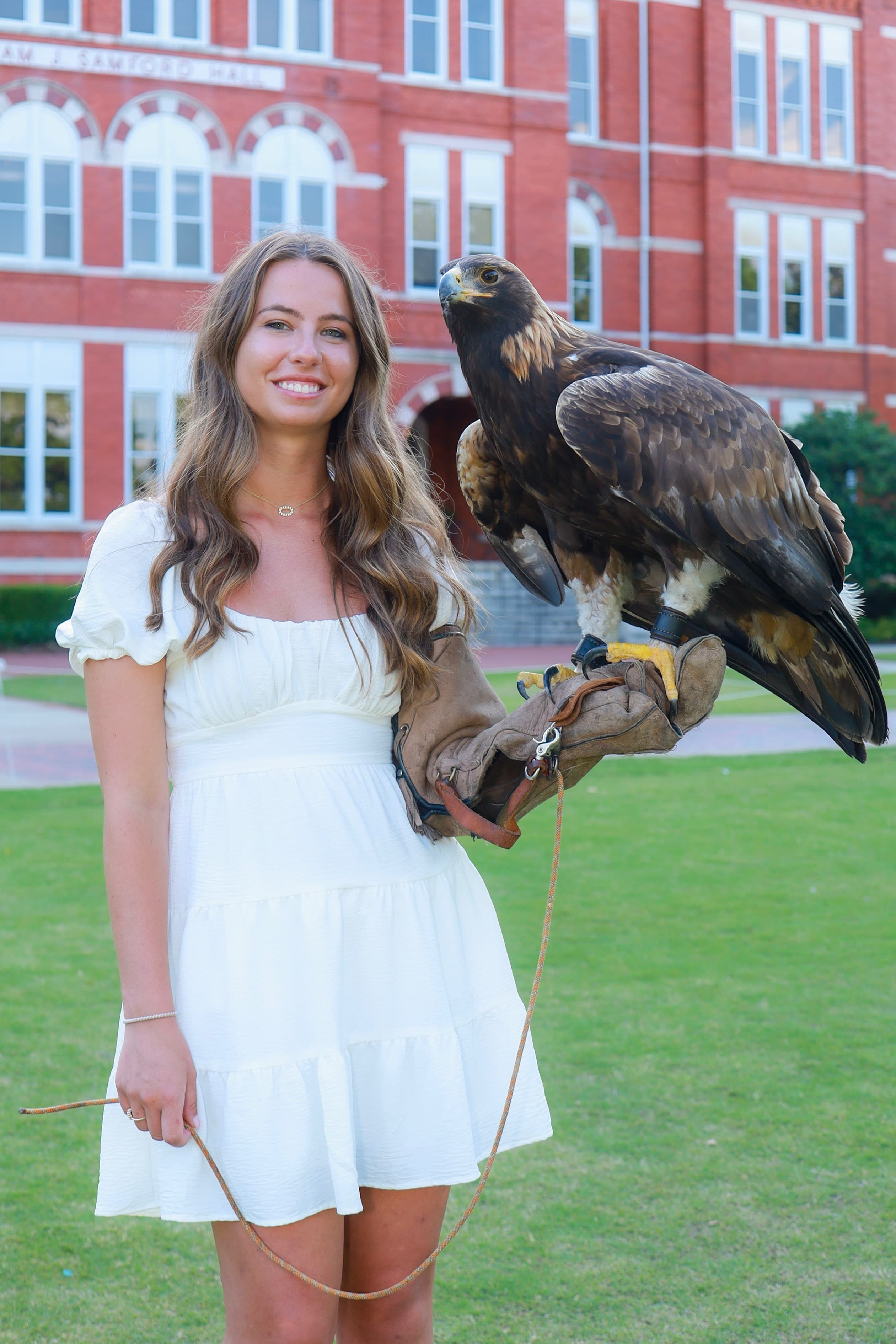 Katelynn with golden eagle at Samford Hall